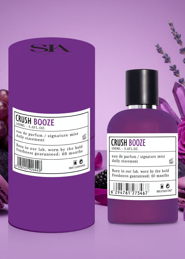 Apa de Parfum 100ml CRUSH BOOZE, sticlă mov și cutie cadou mov pe fundal violet, parfum intens pentru el și ea