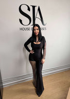 Salopetă neagră din lycra cu inserții din plasă strălucitoare la SIA House of Dresses.